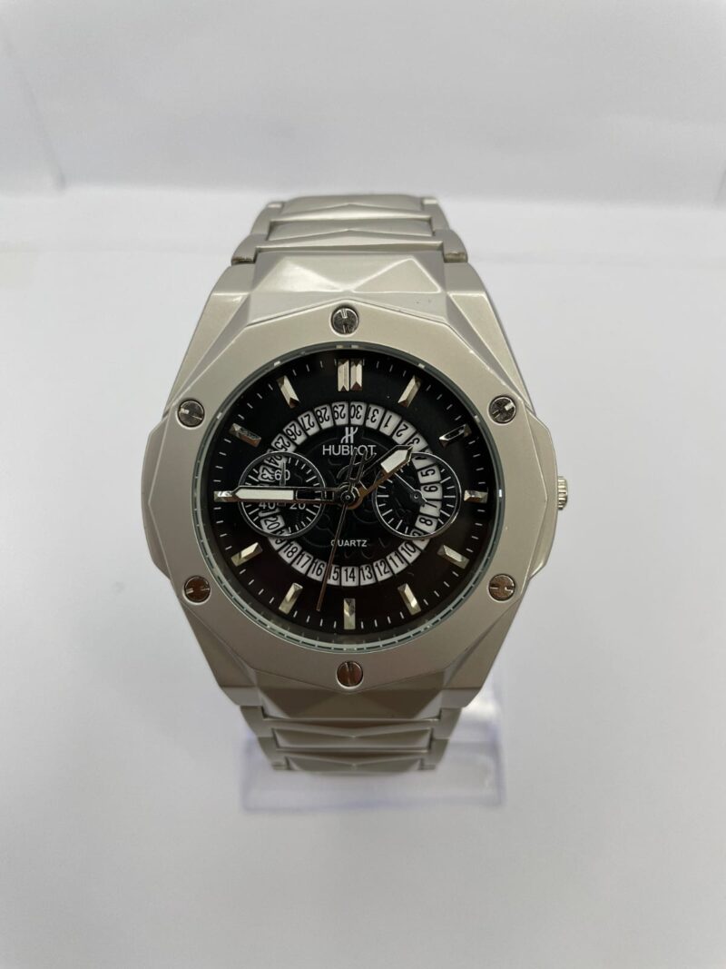 Hublot Diamond Edition quartz men's watch with black multi-dial face, faceted silver case, and stainless steel bracelet – luxury wristwatch close-up.