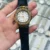 White Dial / Black Strap / Gold Tone Case