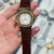 White Dial / Gold tone Case / Brown Strap